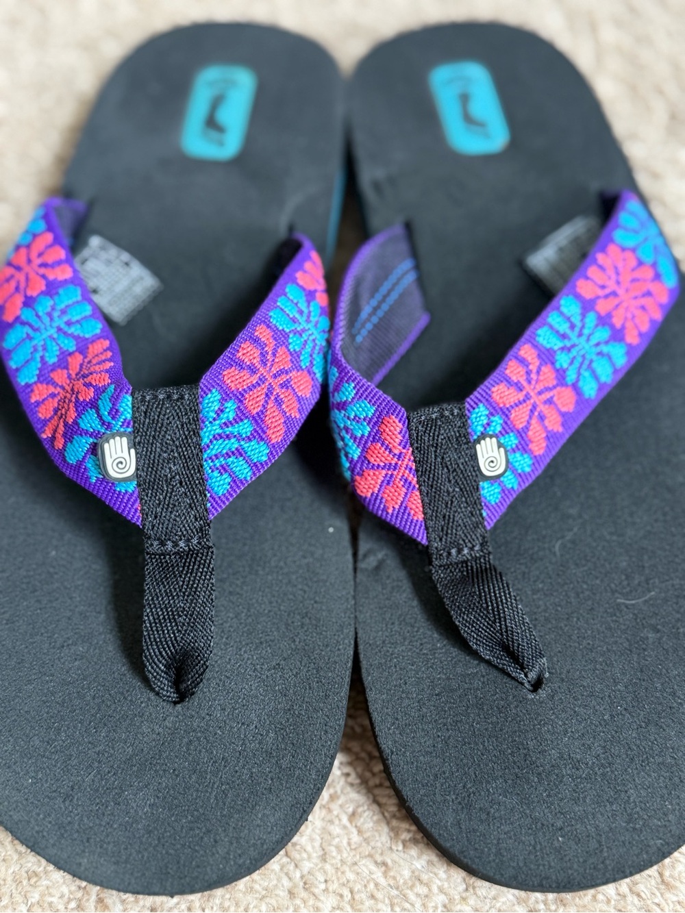 Teva Black Flip Sandals with Purple, Blue & Pink Floral Straps